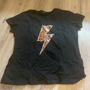 Black and cheetah print t-shirt. XL size 12. New. Never worn